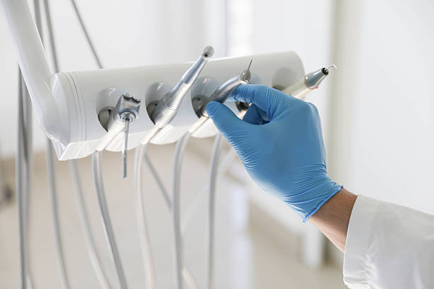 Professional Dental Implants technician working in Minoa, NY